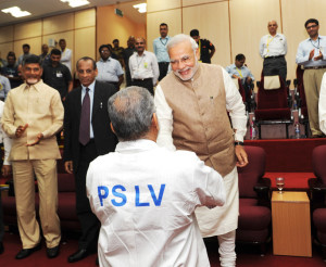 The Prime Minister, Shri Narendra Modi congratulating the ISRO Chairman, Dr. K Radhakrishnan on the successful launch of PSLV C23, at the Mission Control Centre, at Sriharikota, in Andhra Pradesh on June 30, 2014. The Chief Minister of Andhra Pradesh, Shri N. Chandrababu Naidu is also seen.