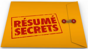 Resume Secrets words stamped on yellow envelope to illustrate tips, guidance, advice and instructions for a job interview or applying for an open position